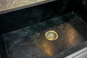 A custom sink adding value to a kitchen & bath