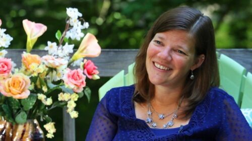 Laurel Trahan, President of Age at Home NH, smiling during a home accessibility consultation.